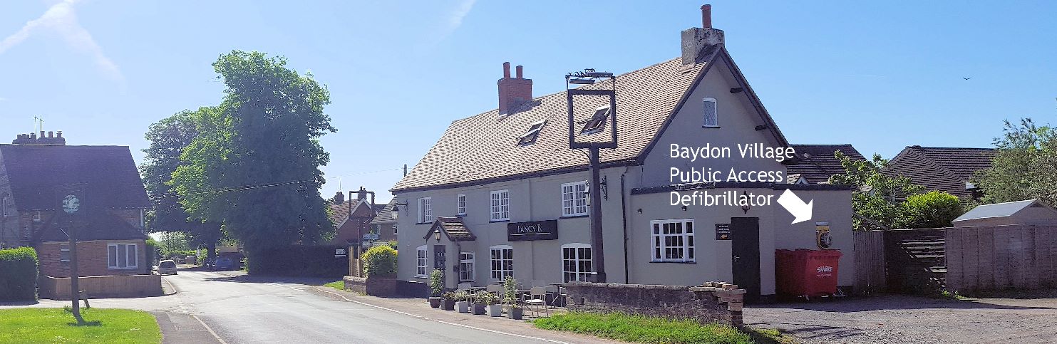 Baydon Village Defibrillator on car park wall of the pub.